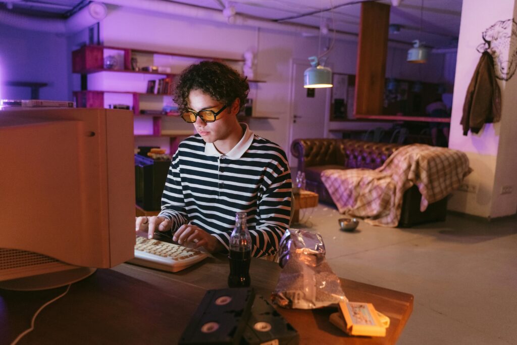 pexels photo 8885193 8885193 Teen enjoying a vintage gaming experience indoors, highlighting nostalgia and retro vibes.